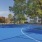 a basketball court with trees and buildings cameron south park charlotte nc